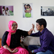 Pramodini Roul, 24, an acid-attack survivor and a campaigner at Chhanv, an NGO that supports acid-attack victims, and her partner Saroj Sahoo, 26, a manager at Chhanv share a moment at the “Sheroes” home for acid attack victims in Noida, India.
